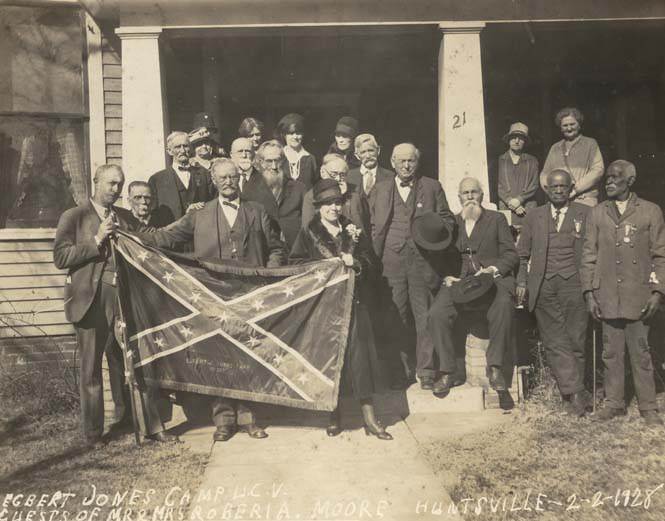 Former confederate soldiers and their families gather in Huntsville, Alabama US for a reunion in 1928. The 2 black men on the right were also former confederate soldiers. A handful of blacks actually fought in the Civil War for the South, usually under false pretenses or forced as slaves to do so. Rarely were they armed, and that debate on whether to armed them as the need for more soldiers arose during the war was a major issue in the Confederate government. It would take until the last month of the war for the Confederates to officially allow black soldiers to be armed, but many still served and in a few cases were armed and fought for the South.