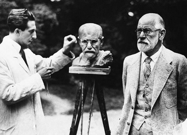 Sigmund Freud posing for a bust being made in his likeness in Germany in 1931. Freud was brilliant, but also a strong and outspoken individual. He had 2 sons fight in WWI for Austria-Hungary, and later would have to flee Germany when the Nazi's took over. His books were often burned, and his once celebrated career in Germany was suddenly dangerous and banned. He actually died shortly after the WWII started, not seeing the destruction of his homeland.