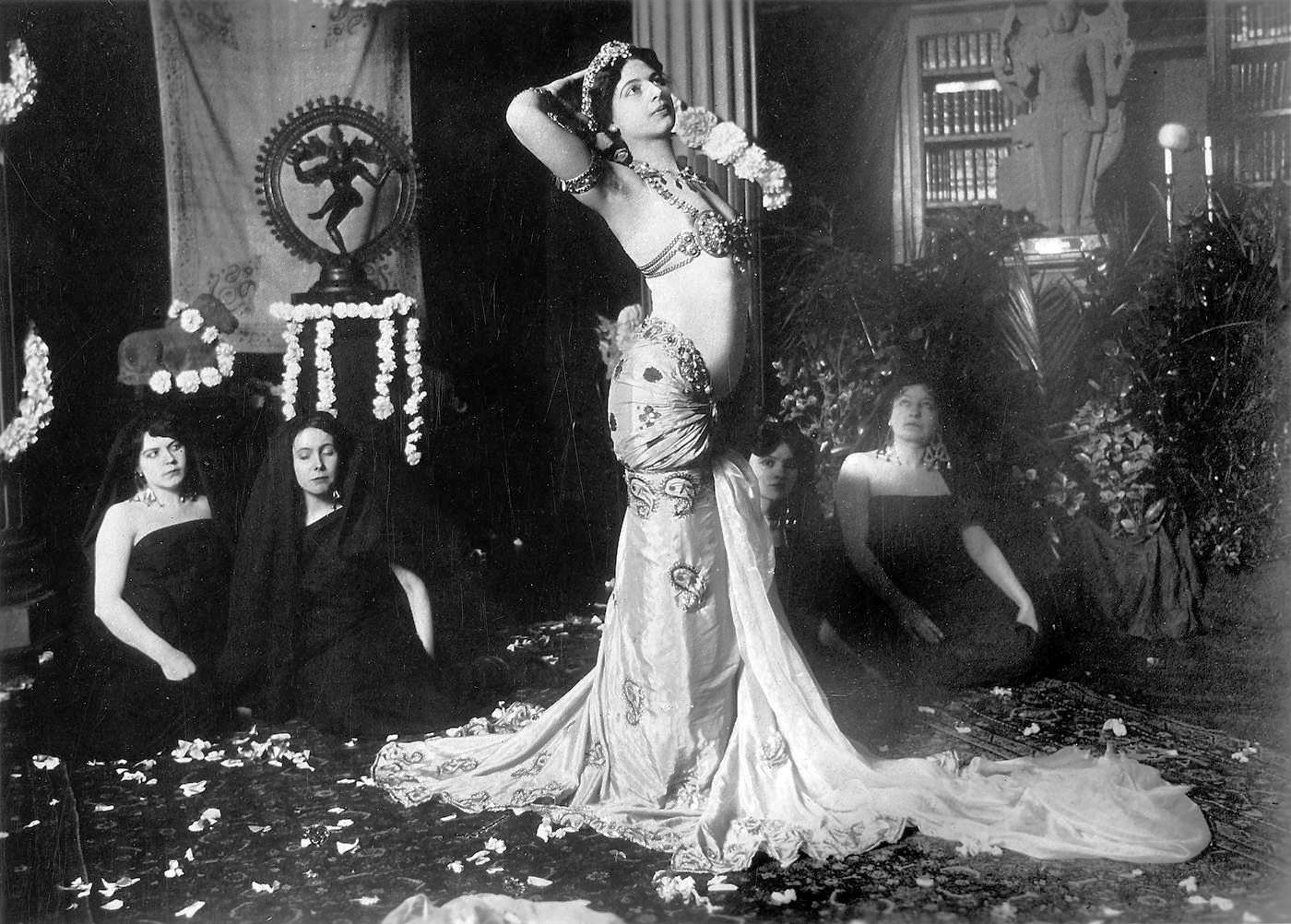 Mata Hari, real name Margaretha Geertruida Zelle, posing for a still from a film in 1900. A Dutch citizen, she was a silent film actress in France. In 1917, during WWI, she was tried, convicted, and executed by firing squad for espionage and treason against France. She was declared guilty as a double agent for the Germans. To this day, the evidence against her is very controversial and many believe she never actually spied for the Germans. Her death was a great propaganda move against internal strife in France during the war, which changed in the Allies favor around the same time as her death.