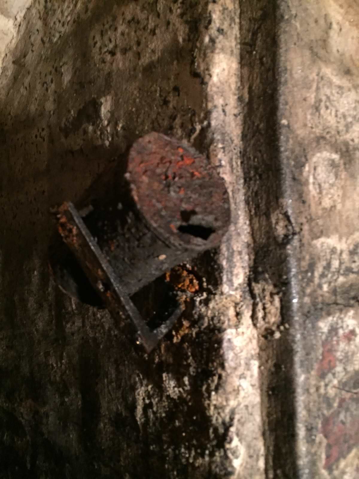 "The only object in the coal chute room. A can. Totally rusted everywhere so nothing to distinguish what it could have been. Cans were trademarked back in 1811. At around 1840-1850 they were commercialized which could mean a worker or someone left the can when they sealed up the wall during the time they built the manor in 1851."