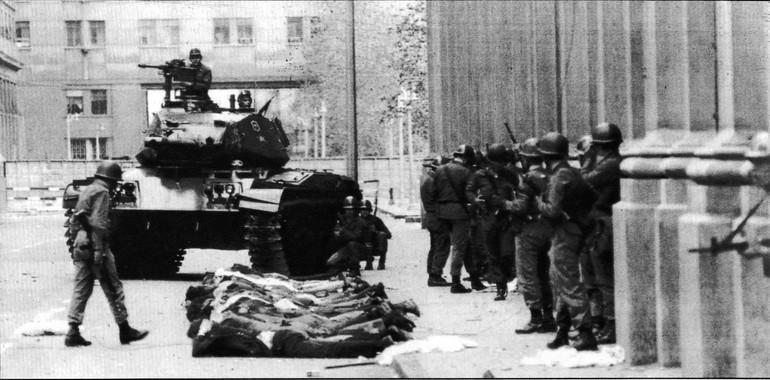 Military units using heavy armor descend on government buildings in Montevideo, Uruguay during a military coup in 1973. The coup overthrew the democratically elected government, using the concern of Marxist guerillas taking over, and began a 12 year dictatorship with a military junta in support. The Uruguayans actually had little bloodshed during the coup, and would have a general strike uprising against the dictatorship in 1984. This also had little bloodshed unlike most uprisings over dictatorships, and it would be accepted. The Junta and dictatorship government was dissolved and democracy restored. Most Central and South American countries had dictators at some point, and most had bloody overthrows, so this is a rare instance in which such grand events happened and happened quickly with overall little bloodshed.