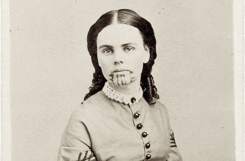 Olive Oatman. Relax. This is not a vampire who’s recently feasted on the neck of her last victim. Those marks on her chin are tattoos. Oatman, was 14-years-old when an unconfirmed tribe of Native Americans killed her family. That was in 1851. Only she and her younger sister survived, traded to a band of Mohave who tattooed both sisters. Oatman’s sister did not survive the ordeal, dying of starvation before they released Olive.