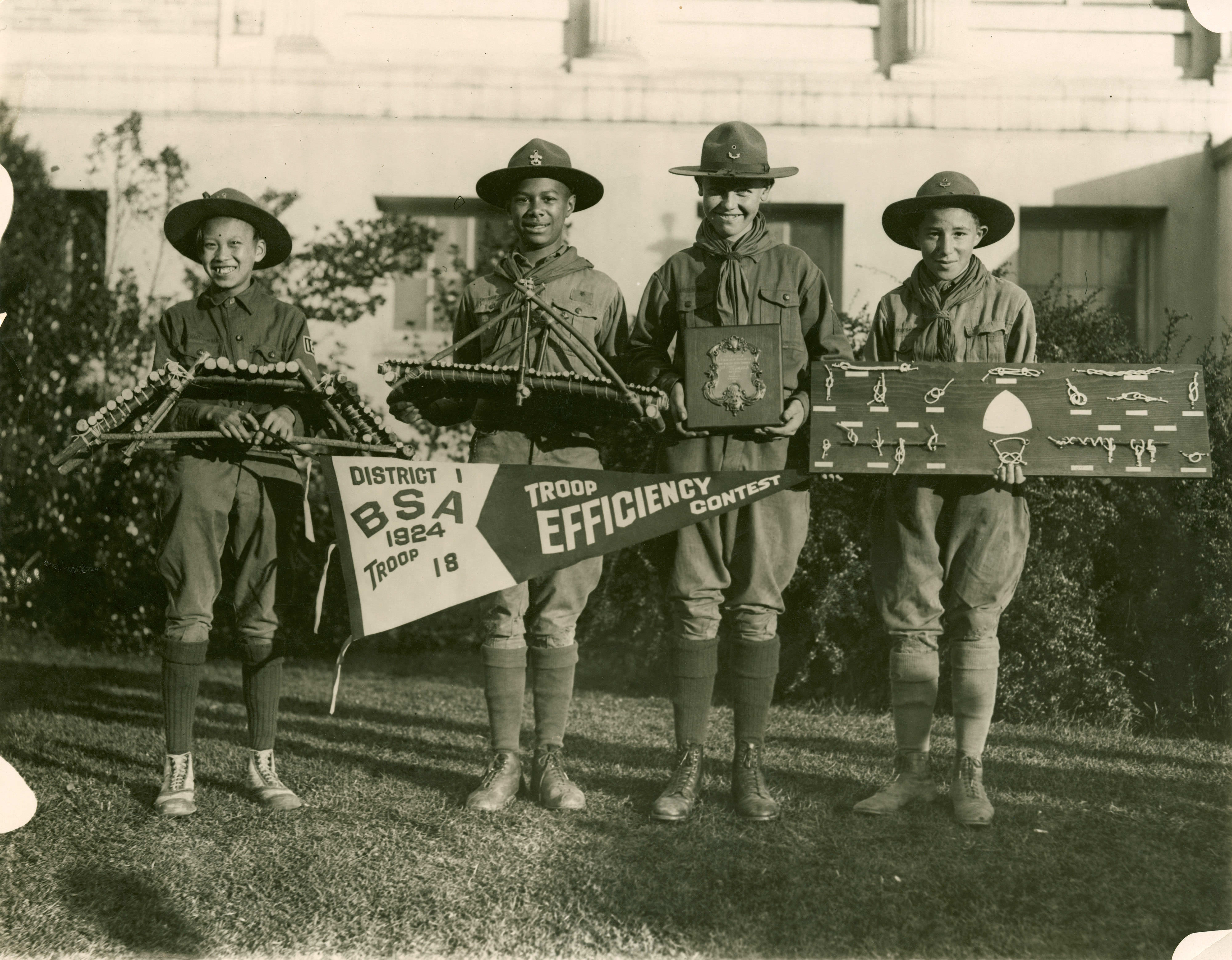 Winners in different Boy Scouts competitions proudly show their winning projects off in California, US in 1924. This was in an area that did not segregate the boy scouts, but many other states all over the US did as well as with everything else. Some states did not segregate most things, including schools and organizations, but most of the US, including many northern states did in fact segregate everything at this time. It would take 20+ years just for the military to desegregate, and another 45+ years for buses, specific jobs, schools and everything else to desegregate across the US as well.