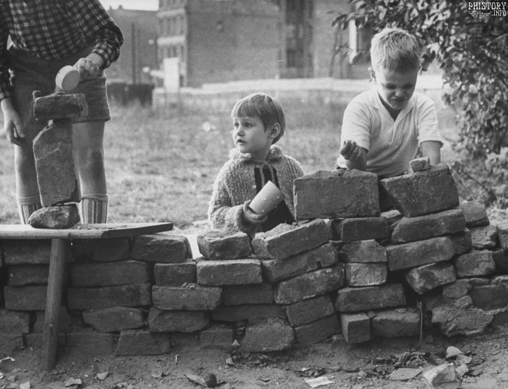 German kids building their own Berlin wall, 1961.