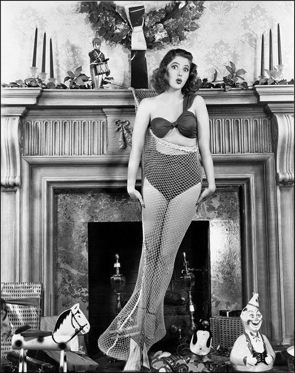 Martha Vickers as a pinup model for a Christmas shoot in 1944.