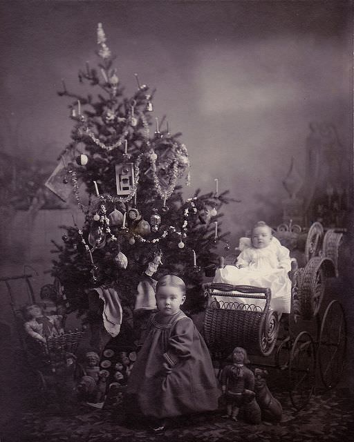 Children pose with their new Christmas gifts in Denmark in 1904.
