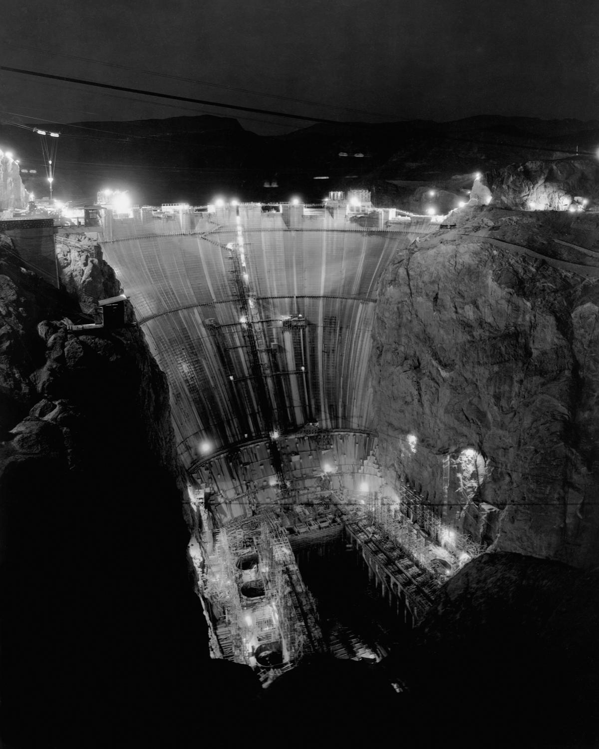 Nighttime construction of the Hoover Dam, 1931