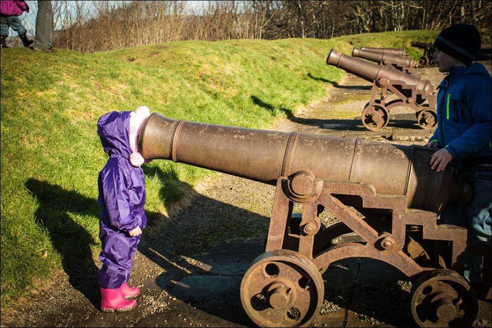 kid with head in cannon