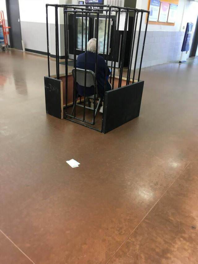 wtf walmart door greeter in cage - low ma