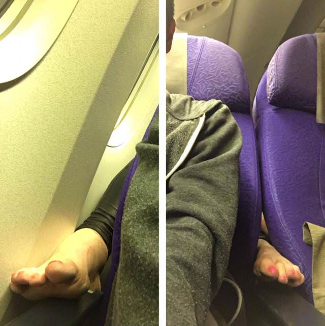 wtf airplane armrest feet