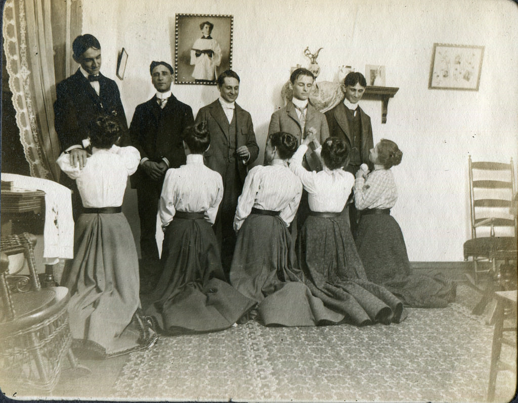5 Women pose for a picture as they playfully ask for the affections of the men standing in London, England in 1892. Although this would appear as clean fun, many women of the time did not work, did not have the vote to have their voice heard, or overall even have much ability outside of the prospect of a quality marriage at the time, and would turn this kind of act into a real pursuit to marry proper and have a good life.