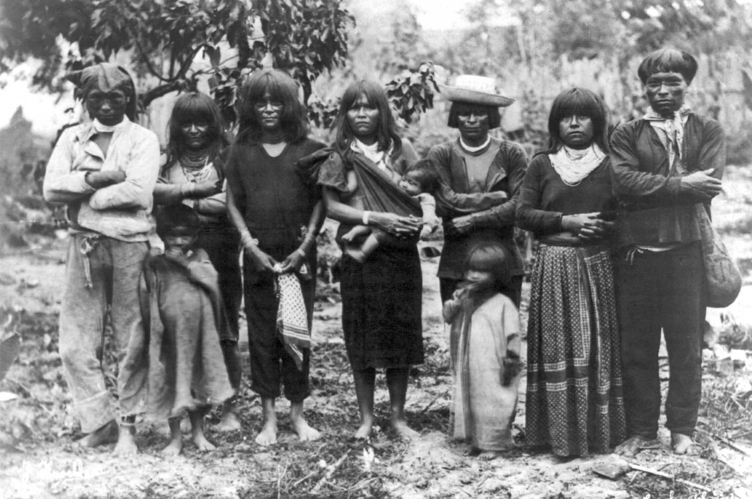 Native South American Indians pose for a picture with clothes given to them by the government somewhere in Brazil in 1922. Brazil had major plans to civilize the native population, and by any means necessary. This became very important as more discoveries of gold, silver, and other natural resources would be discovered on tribal lands. The Brazilian government forced the natives to move, integrate, and adapt, and if they did not, in some cases, violence would occur. This practice is sadly still technically ongoing, and certain tribes are still fighting against the Brazilian government on various things almost all relating to their claim of ownership of their own lands.