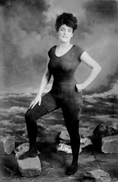 Annette Kellermann, a professional swimmer, a film actress, and a writer, poses in a swimsuit. She was arrested and charged with indecent behavior in 1907.