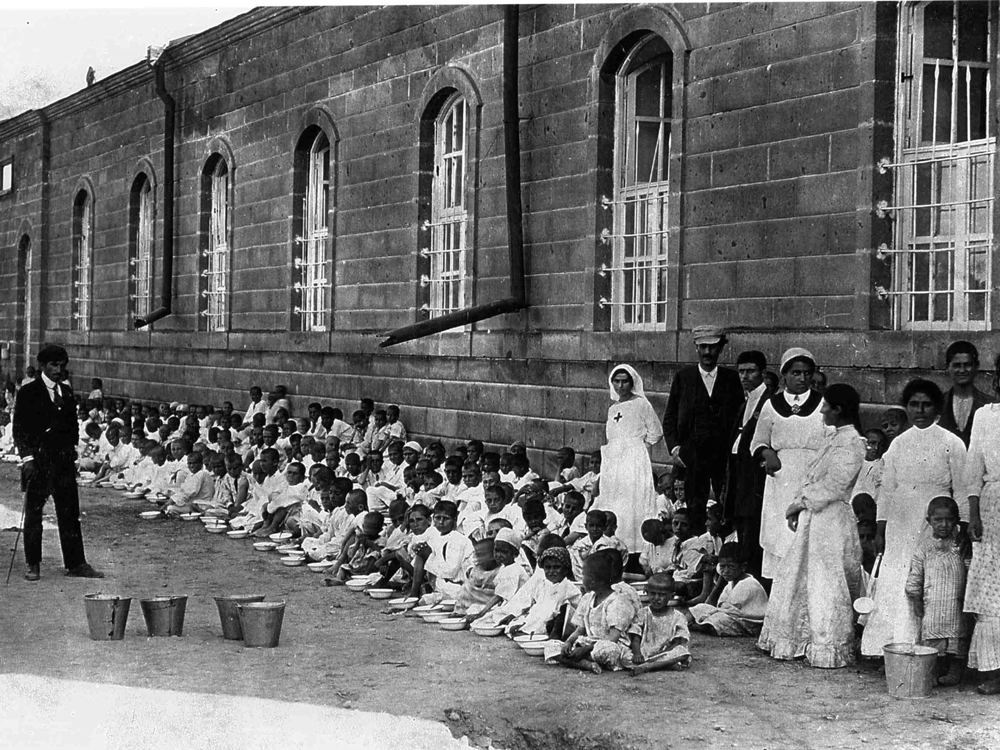 Armenians, mostly children, wait to be deported in Malatya, Turkey in 1918 during the Armenian Genocide. Similar to what the Germans did with Hungarian Jews at the end of WWII, the Ottoman Turks sped up efforts to kill as many Armenians as possible in 1918 before the war ended. Losing all ability to continue to produce weapons and fight, the war was lost, but the ability to continue the Genocide by starving people to death was doable. Around 1.5 million Armenians were killed during the Genocide, with up to 400,000 dying in 1918 alone. Sadly, every Armenian in this picture would die within a month of this picture.