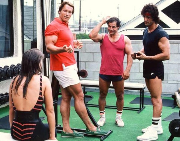 Arnold Schwarzenegger and Sylvester Stallone – workout session in Venice Beach, 1980s.