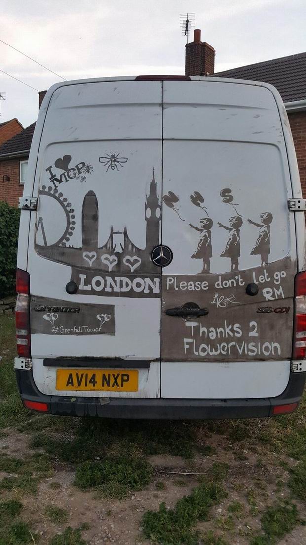 WTF Guy Draws In The Dirt Of His Van