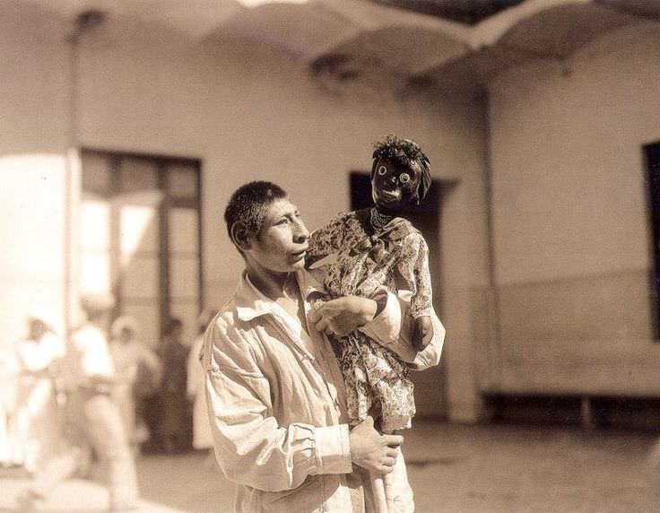 A mental health patient and his doll in the 1920s.