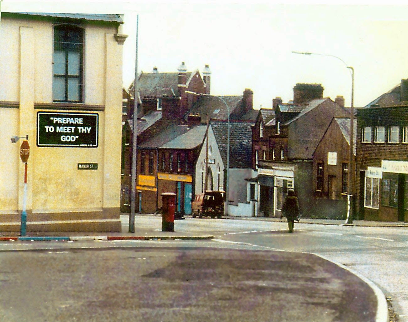 A British Army bomb disposal specialist approaches a car bomb during the troubles, 1970s.