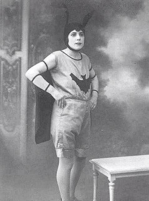 A woman dressed up as something similar to Batgirl, 1904.