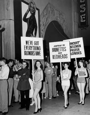 Women protest the new film Gentlemen Prefer Blondes outside the Chinese Theater in LA, US in 1953.