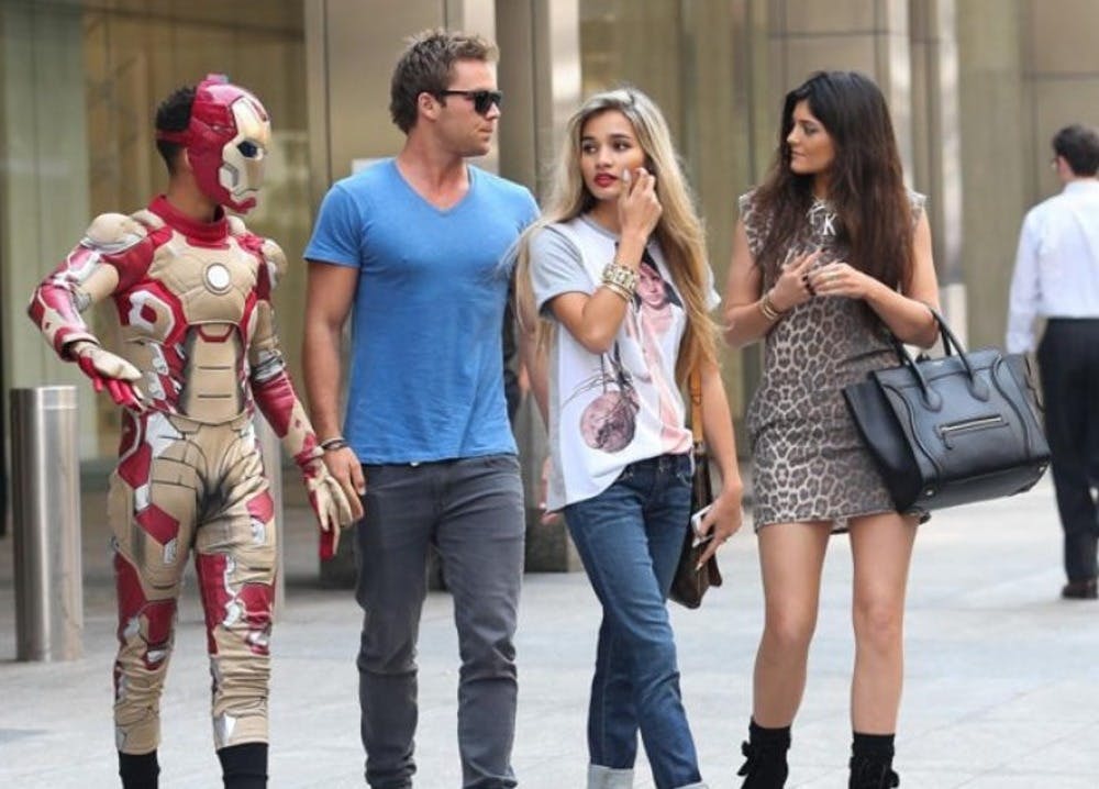 You see Jaden Smith? He is the one in the Iron Man suit. Paparazzi called him immature out of spite.