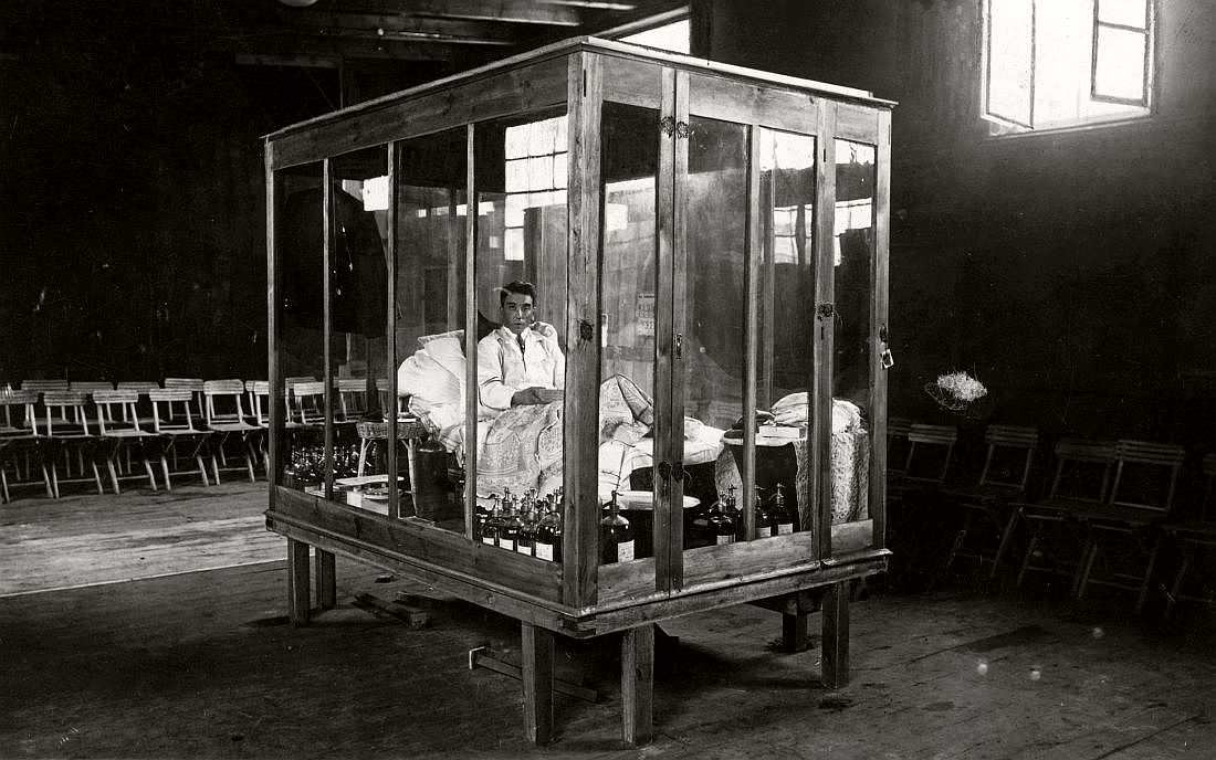 P. Kriese stays in a glass enclosure as he breaks the world record for longest time fasting in Poznan, Poland in 1929.