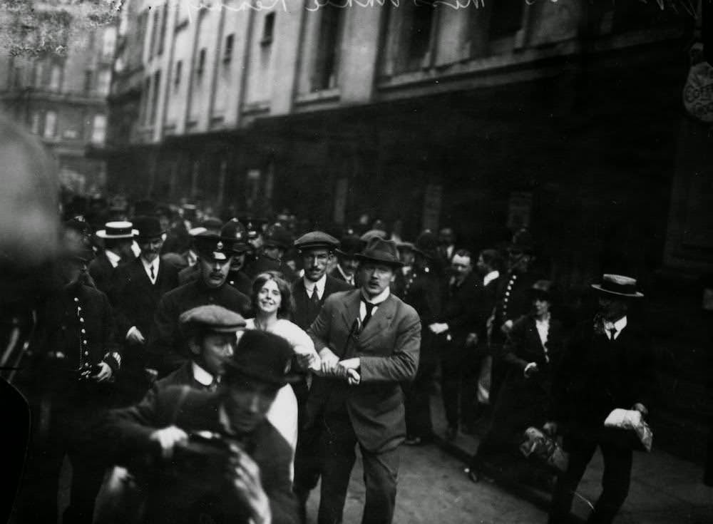 English suffragette Annie Kenney is arrested during a demonstration in London, 1913.