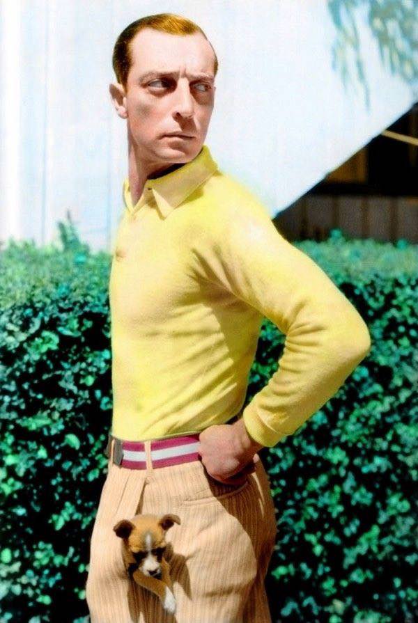 Buster Keaton with pocket dog, colorized.