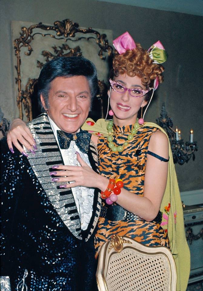 Liberace and Cher.
