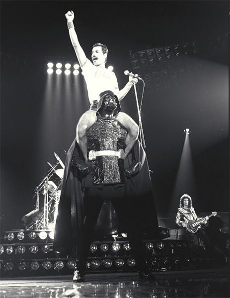 Freddie Mercury ridding Darth Vader, Radio Gaga performance.