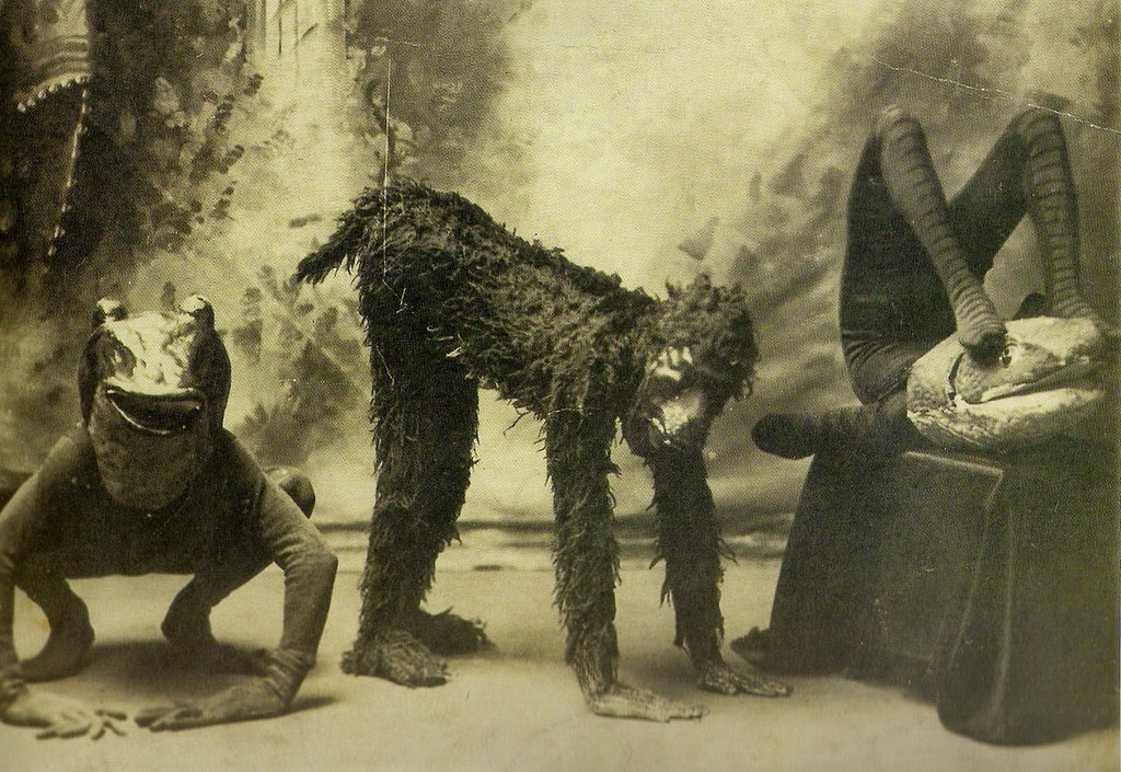 Performers who play animals in a play pose for a picture in costume in London, England in 1894.