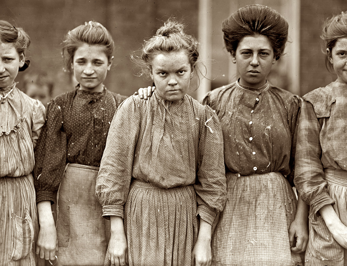 Young ladies after a day of plucking chickens in New York City, US in 1908.