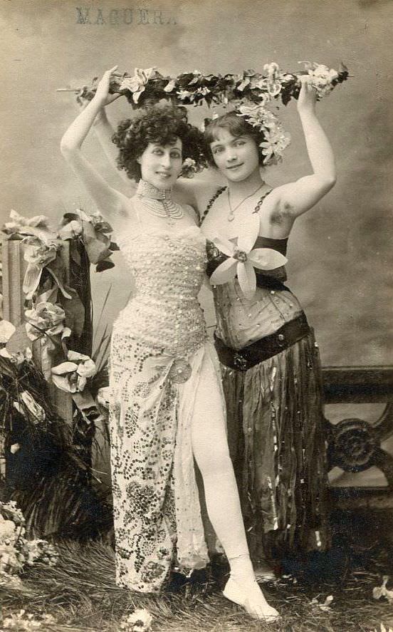 Girls pose for a risque picture used on postcards in France in 1902.