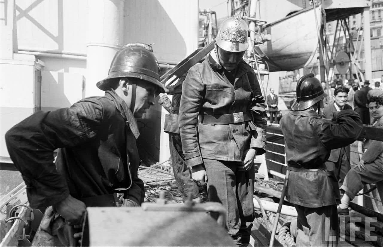 Firemen known as bomberos in Valparaiso, Chile in 1950.