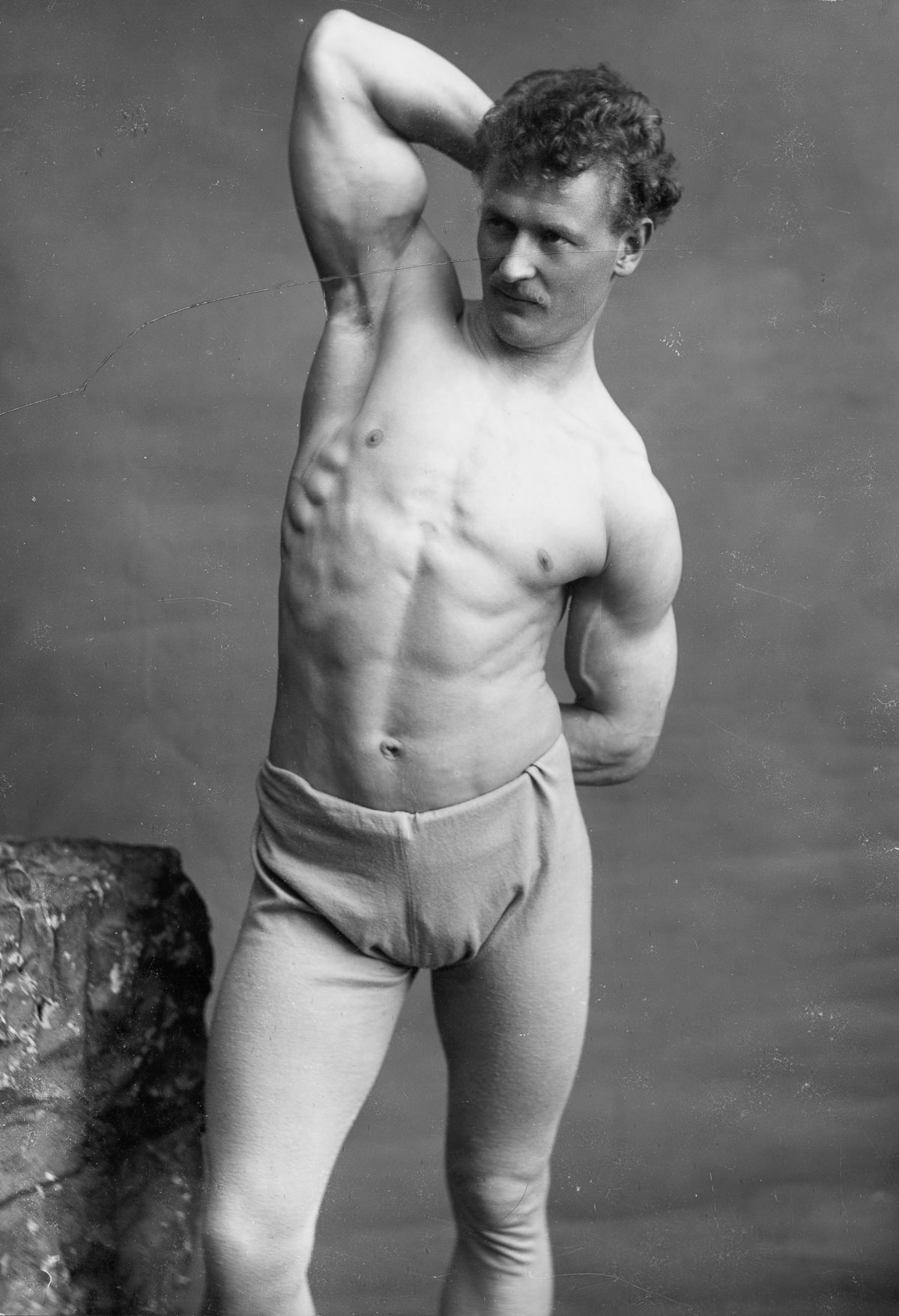 Eugene Sandow, a male model and strongman somewhere in the US, 1912.