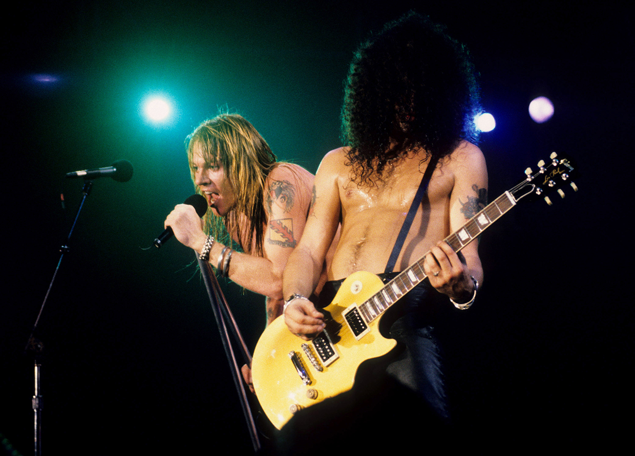 Axl Rose and Slash. No band scaled higher highs or plumbed lower lows than Guns N' Roses did during their rocket ride to fame in the late 1980s. The legendary excesses, ego-fueled clashes and failure to agree on a musical direction destroyed the band from the inside, with guitarist Slash finally throwing in the towel in October 1996, saying, "Axl's whole visionary style, as far as his input in Guns N' Roses, is completely different from mine. I just like to play guitar, write a good riff, go out there and play, as opposed to presenting an image." Rose said "There's zero possibility of me having anything to do with Slash other than by ambush, and that wouldn't be pretty," but then there was a reunion tour.