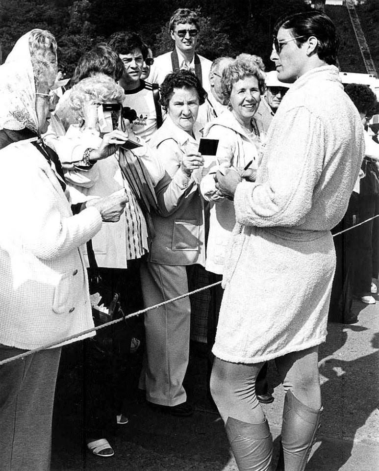 Christopher Reeve signs autographs during a break in filming the Niagra Falls scene on the set of Superman 2, 1980.