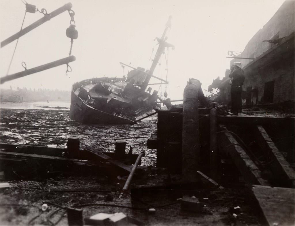 A picture of the harbor at Texas City, Texas, US after a massive explosion aboard the French-registered vessel SS Grandcamp caused a chain reaction that wiped out much of the ships, factories, and some homes near the port in 1947. The SS Grandcamp had a fire while docked, and her cargo of approximately 2,200 tons of ammonium nitrate detonated. The blast was one of the largest non-nuclear explosions ever, and the result spread to the industrial area of the port city. Fire after fire and other small explosions continued until it finally ended after almost a day. People worked nonstop to try and stop the spreading but mostly had to wait for the fires to burn out. Every ship in the port at the time and every building within half a mile of the SS Grandcamp was pretty much destroyed.