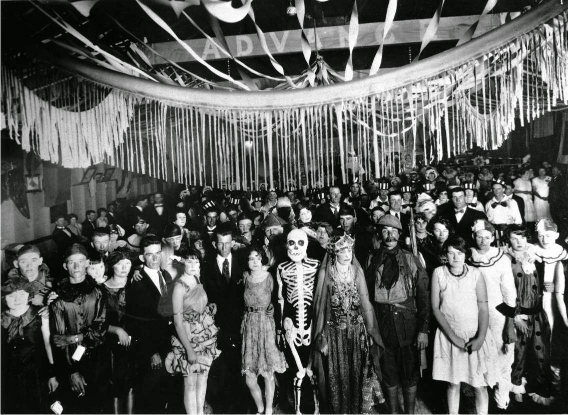 Patrons pose for a picture at a costume party in Townsville, North Queensland, Australia in 1923. Notice virtually no one is smiling.