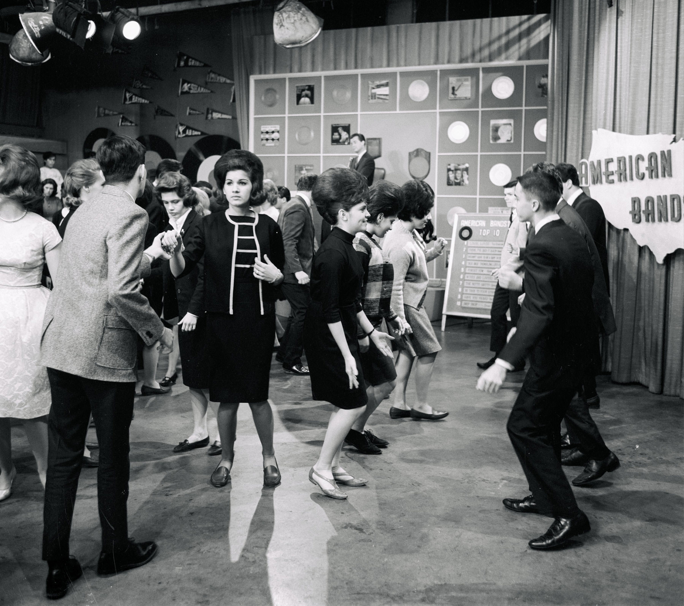 Ladies working the Beehive Hairdo while dancing on American Bandstand in the US, 1965.