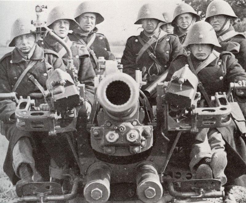 The crew of an anti-aircraft gun in Denmark in 1940, just weeks before Nazi Germany invaded.