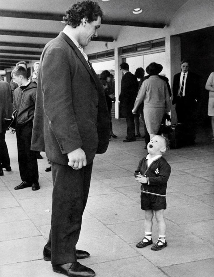 Little boy meets André the Giant, 1970s.