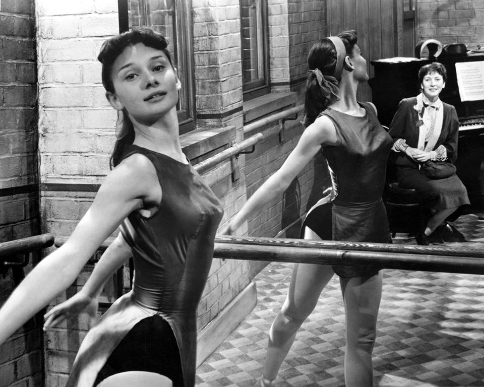 Audrey Hepburn rehearsing dance at the barre, circa 1950.