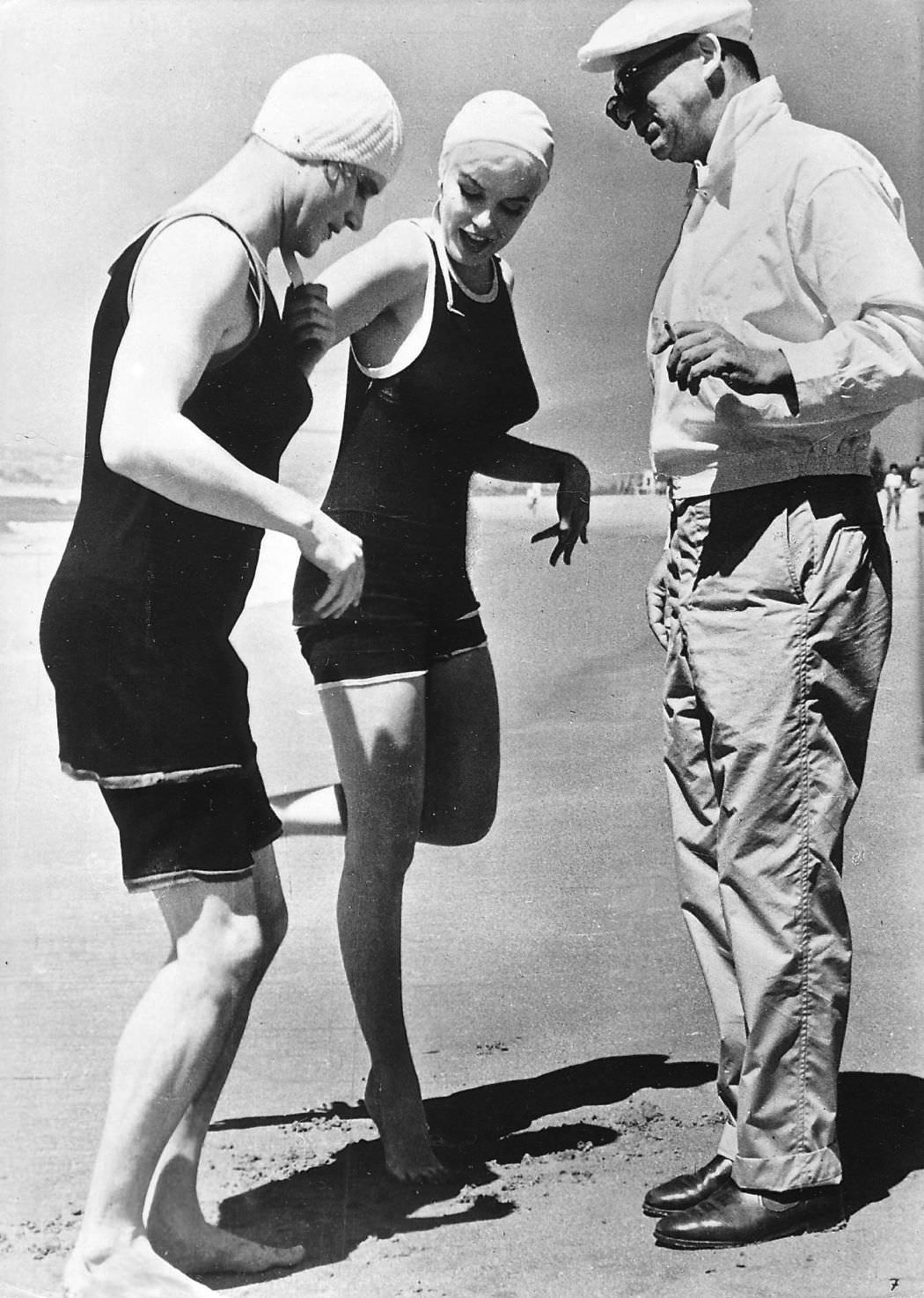 Jack Lemmon, Marilyn Monroe and director Billy Wilder prepare for a scene in Some Like It Hot in 1959.