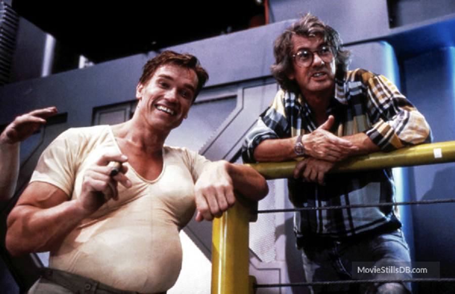 Arnold Schwarzenegger and Paul Verhoeven have a laugh while filming Total Recall in 1990.