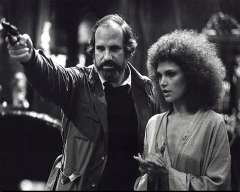 Brian De Palma prepares Mary Elizabeth Mastrantonio for a scene in Scarface in 1983.