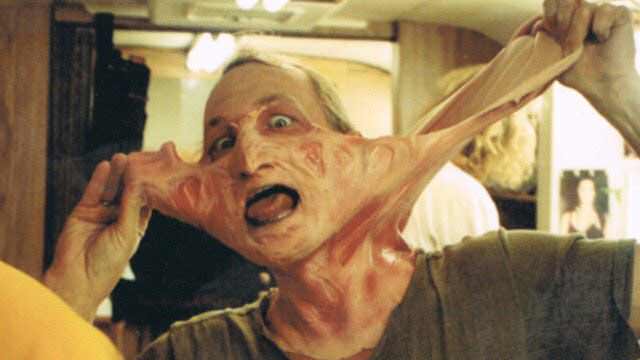 Robert Englund messing around with his prosthetic makeup for A Nightmare on Elm Street in 1984.