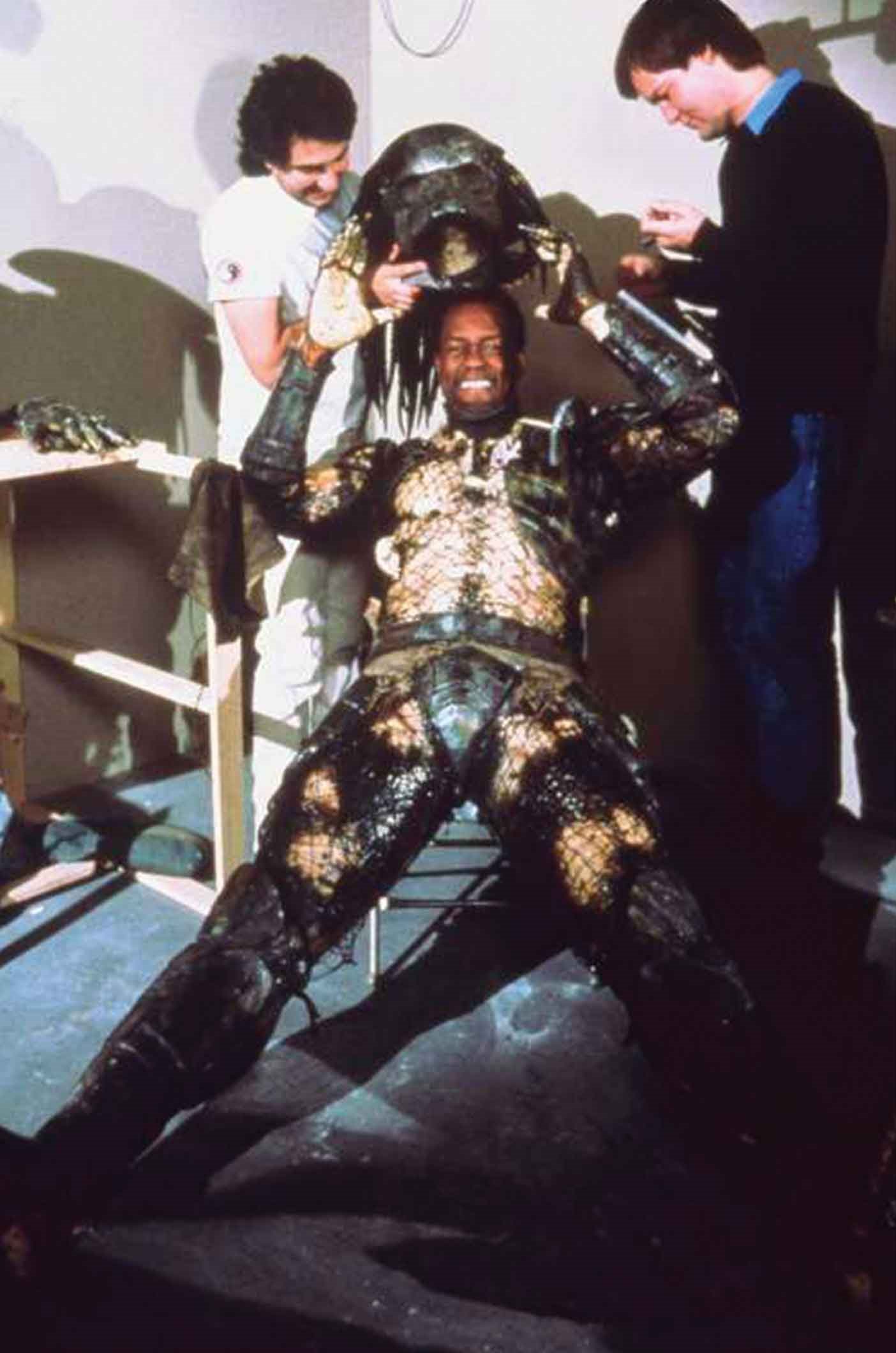 Kevin Peter Hall taking off his costume on the set of Predator in 1987.