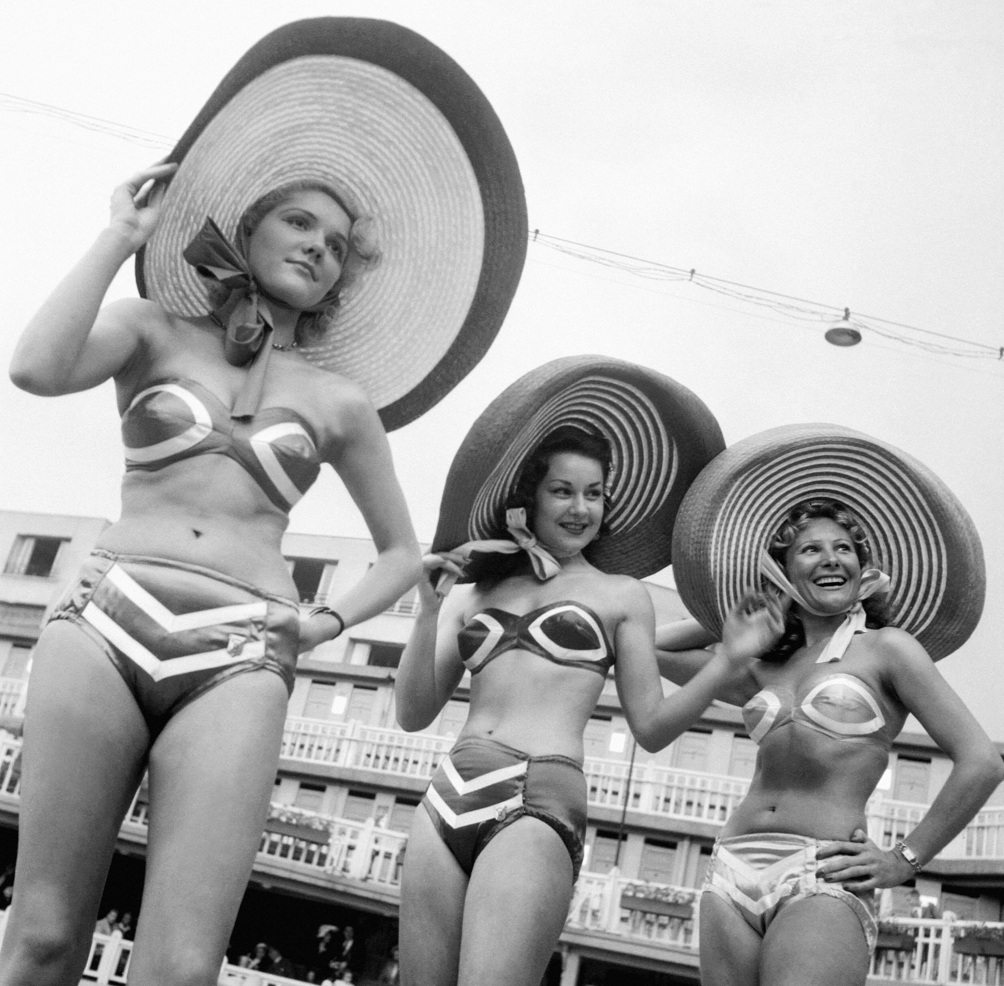 Models showing off a new kind of bikini in Miami, Florida in 1954.