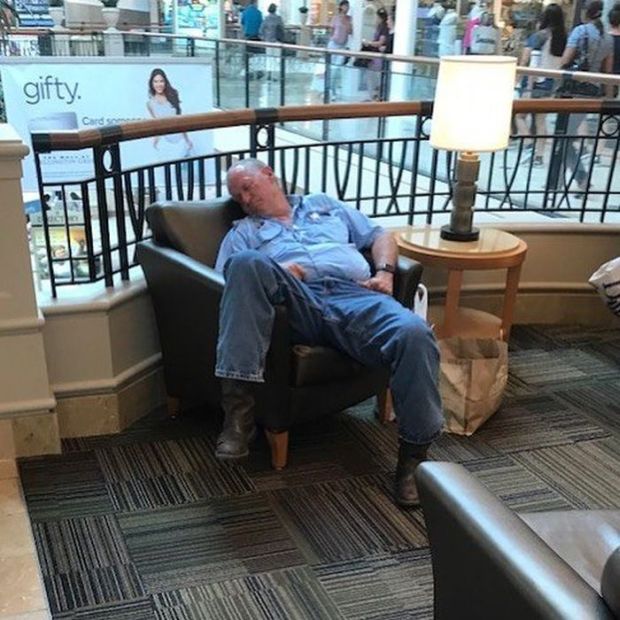 20 Funny Pics Of Miserable Men Caught Shopping With Their Wives